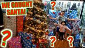 WE CAUGHT SANTA BRINGING THE BEST CHRISTMAS PRESENTS! ARI AND ETHANS FAVORITE MYSTERY SUPRISE GIFTS!
