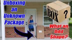 Unboxing an Unknown Mystery package - What is inside? What an odd shape? -Online Reselling