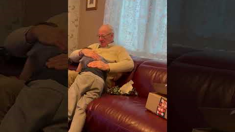 Boy Emotional After Grandpa's Christmas Gift